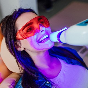 Woman having her teeth whitened