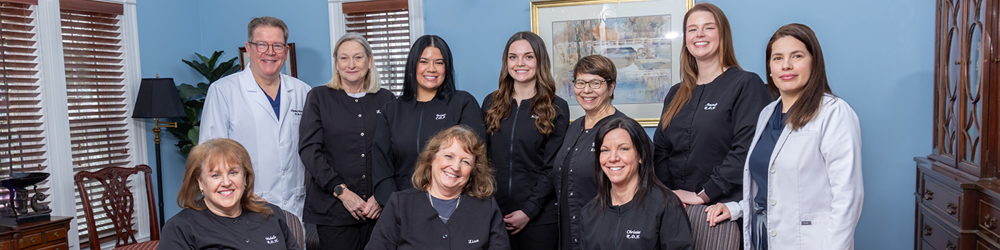 Two female dental team members with masks