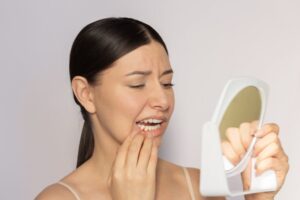 Woman looking at her gums